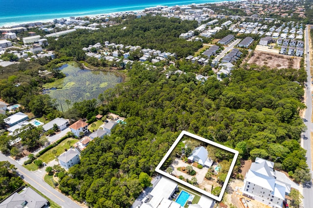 aerial view with a residential view and a water view