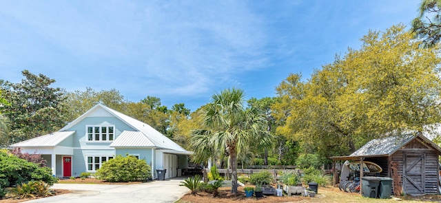 exterior space with concrete driveway