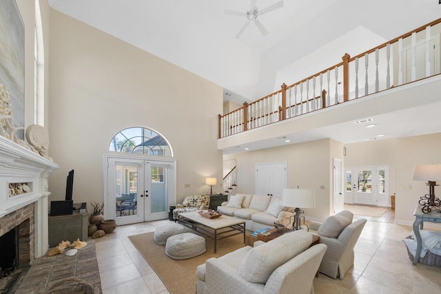 1155 N Troon Dr, Miramar Beach, FL 32550 - living room with french doors, stairway, tile patterned floors, a towering ceiling, and ceiling fan