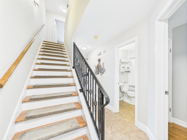 210 Southlake Ct Unit 210, Niceville, FL 32578 - stairs with tile patterned flooring and baseboards