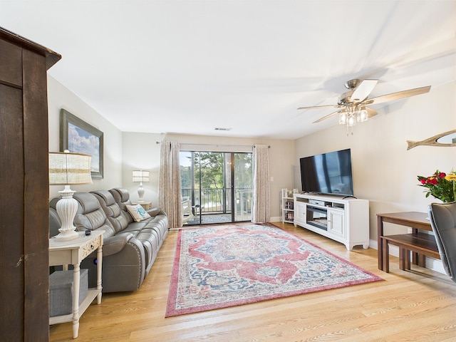 210 Southlake Ct Unit 210, Niceville, FL 32578 - living room with light wood finished floors, ceiling fan, and baseboards