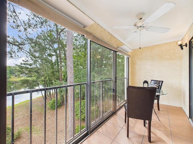 210 Southlake Ct Unit 210, Niceville, FL 32578 - sunroom / solarium featuring a textured wall, a ceiling fan, and plenty of natural light