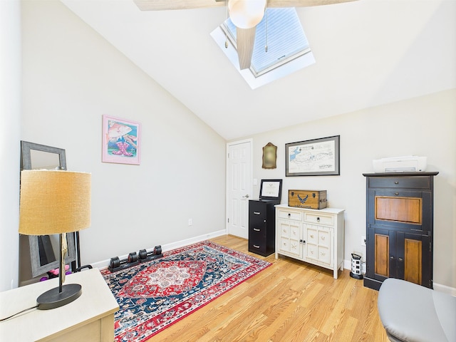 210 Southlake Ct Unit 210, Niceville, FL 32578 - office area with light wood-style floors, a skylight, lofted ceiling, baseboards, and ceiling fan