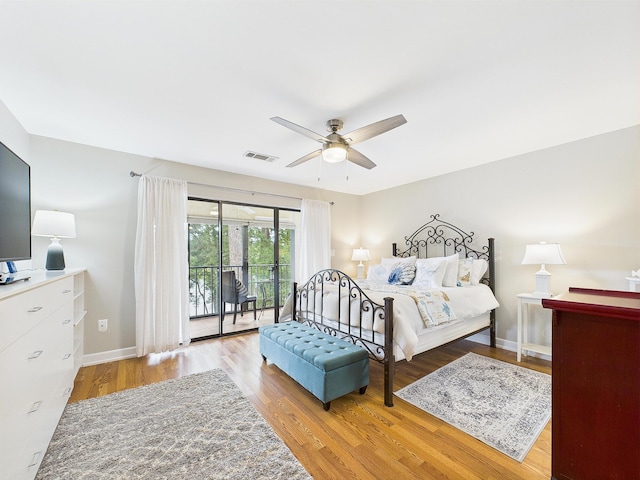 210 Southlake Ct Unit 210, Niceville, FL 32578 - bedroom featuring access to exterior, wood finished floors, baseboards, and a ceiling fan