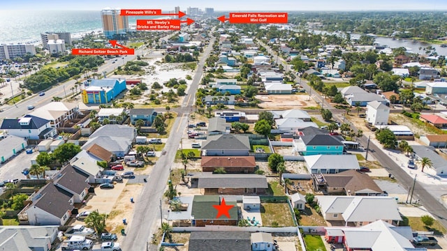 7010 Beach Dr, Panama City Beach, FL 32408 - aerial perspective of suburban area featuring a nearby body of water