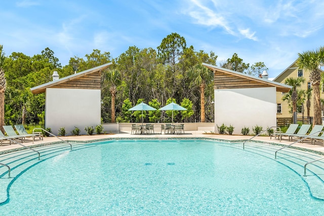 LOT39 String Lily Cv, Santa Rosa Beach, FL 32459 - community pool with a patio and outdoor dining space