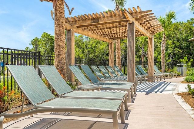 LOT39 String Lily Cv, Santa Rosa Beach, FL 32459 - view of patio featuring a pergola and view of scattered trees