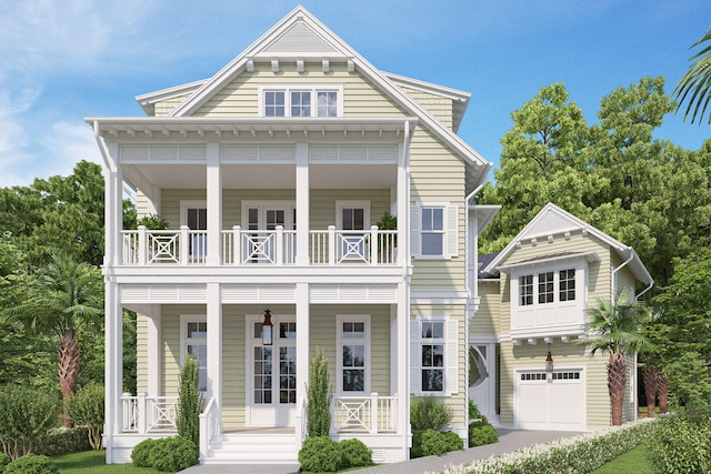 LOT39 String Lily Cv, Santa Rosa Beach, FL 32459 - view of front of property with a balcony, a porch, driveway, and a garage