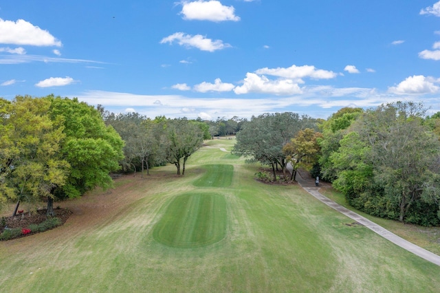 7008 Turnberry Cir, Navarre, FL 32566 - view of community featuring a lawn and golf course view