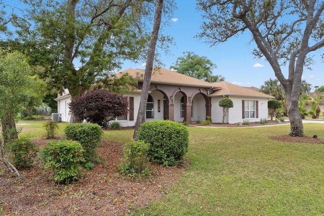 7008 Turnberry Cir, Navarre, FL 32566 - view of front facade featuring a front yard and central AC