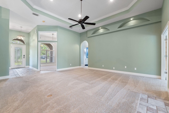 7008 Turnberry Cir, Navarre, FL 32566 - empty room featuring baseboards, carpet floors, crown molding, and a tray ceiling