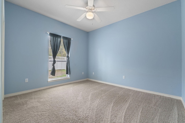 7008 Turnberry Cir, Navarre, FL 32566 - carpeted empty room with ceiling fan and baseboards