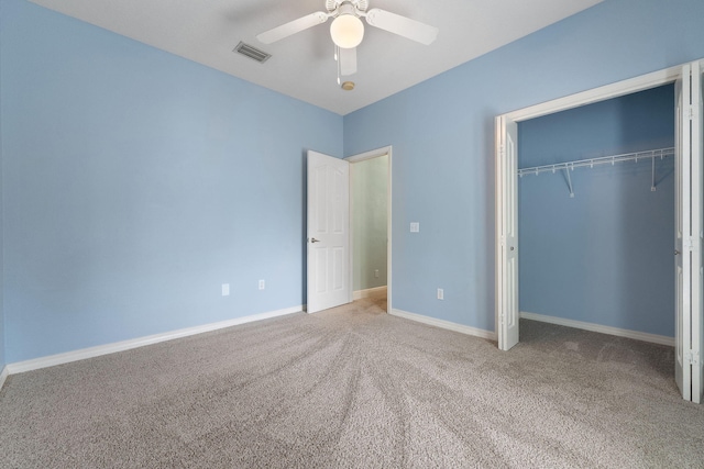 7008 Turnberry Cir, Navarre, FL 32566 - unfurnished bedroom with a closet, carpet, ceiling fan, baseboards, and visible vents