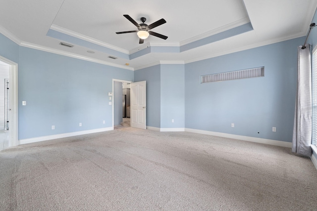 7008 Turnberry Cir, Navarre, FL 32566 - unfurnished bedroom featuring visible vents, ornamental molding, a tray ceiling, and baseboards