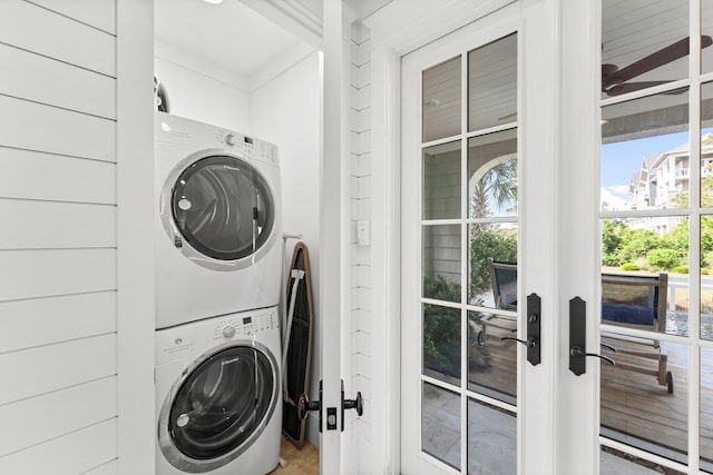 98 Compass Point Way, Inlet Beach, FL 32461 - washroom featuring stacked washer / drying machine and french doors