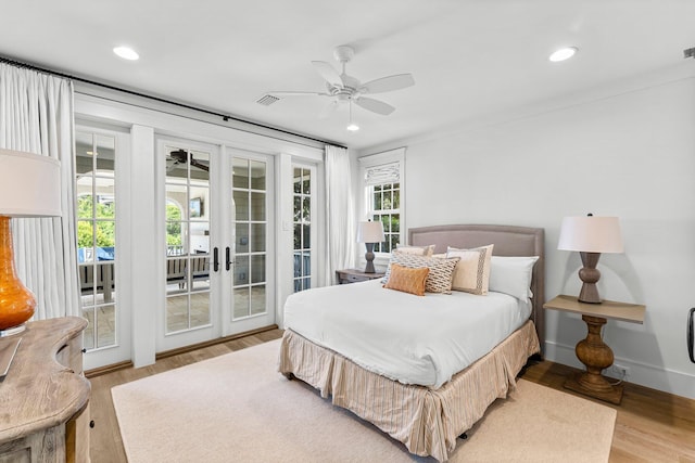 98 Compass Point Way, Inlet Beach, FL 32461 - bedroom featuring access to exterior, multiple windows, french doors, light wood-type flooring, and recessed lighting