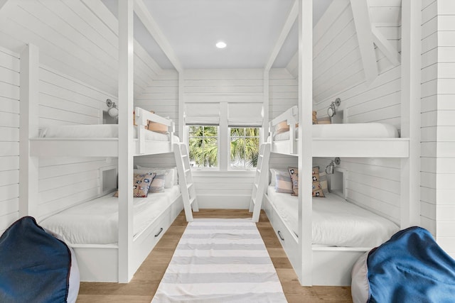 98 Compass Point Way, Inlet Beach, FL 32461 - bedroom with wood finished floors, wooden walls, and recessed lighting