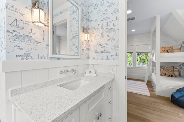 98 Compass Point Way, Inlet Beach, FL 32461 - bathroom with wood finished floors, vanity, and recessed lighting