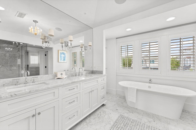 98 Compass Point Way, Inlet Beach, FL 32461 - full bathroom with a chandelier, a shower stall, double vanity, a freestanding bath, and recessed lighting