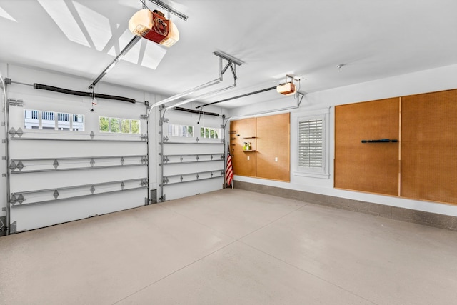 98 Compass Point Way, Inlet Beach, FL 32461 - garage with a garage door opener and baseboards