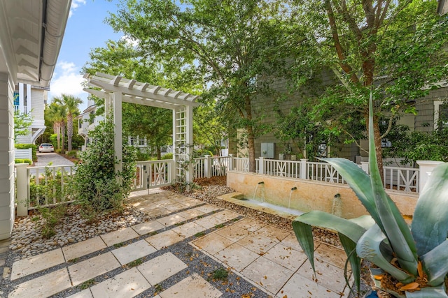 98 Compass Point Way, Inlet Beach, FL 32461 - view of patio / terrace with fence and a pergola