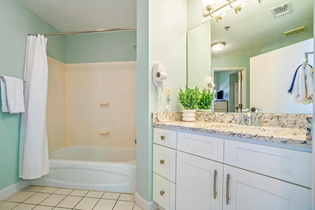 full bathroom featuring tile patterned flooring, vanity, shower / bath combination with curtain, baseboards, and visible vents