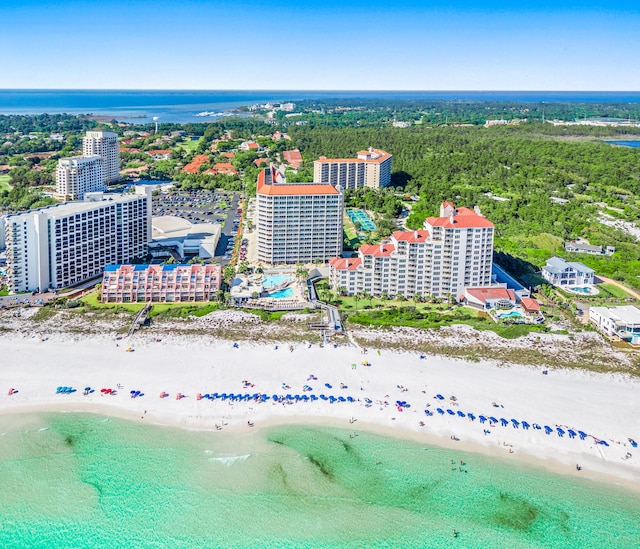 bird's eye view with a view of the beach and a water view