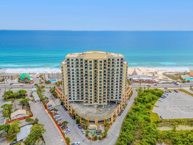 bird's eye view with a beach view and a water view