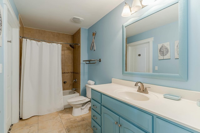 full bath featuring shower / bath combo with shower curtain, toilet, tile patterned flooring, and vanity