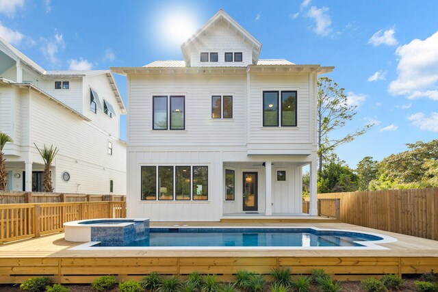 144 Dalton Dr, Santa Rosa Beach, FL 32459 - back of house with a deck, board and batten siding, and a fenced backyard