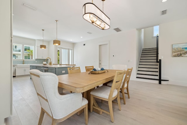 144 Dalton Dr, Santa Rosa Beach, FL 32459 - dining room with visible vents, recessed lighting, and stairs