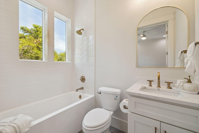 144 Dalton Dr, Santa Rosa Beach, FL 32459 - bathroom with washtub / shower combination, a healthy amount of sunlight, toilet, and vanity