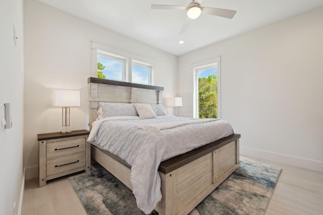 144 Dalton Dr, Santa Rosa Beach, FL 32459 - bedroom with ceiling fan, recessed lighting, light wood-style flooring, and baseboards