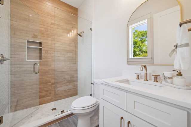 144 Dalton Dr, Santa Rosa Beach, FL 32459 - bathroom with toilet, a stall shower, and vanity