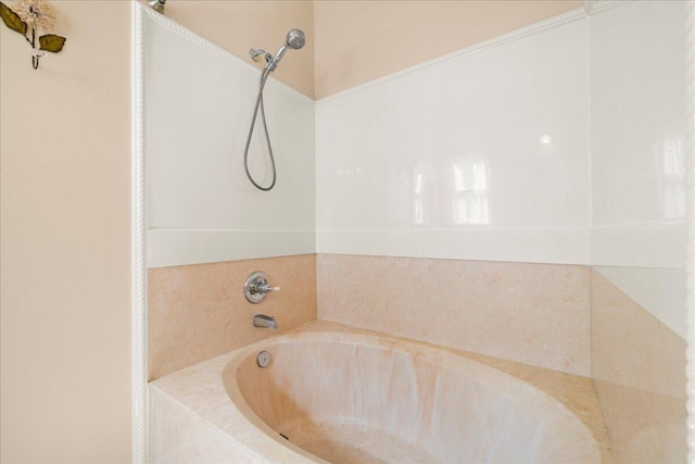 full bathroom featuring a tub to relax in and a shower