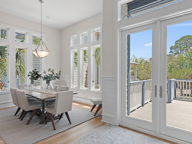 182 My Way, Santa Rosa Beach, FL 32459 - interior space with french doors, wainscoting, and wood finished floors