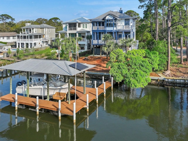182 My Way, Santa Rosa Beach, FL 32459 - view of dock with boat lift, a water view, and a balcony