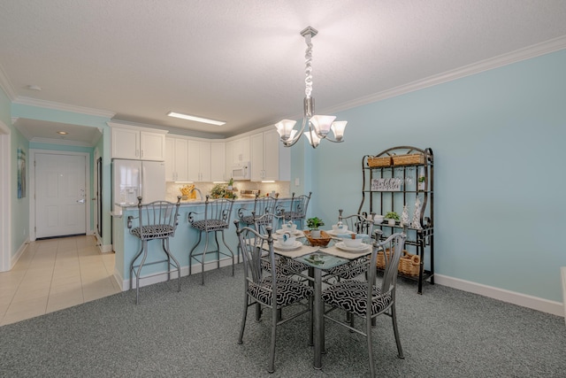 17545 Front Beach Rd Unit 1507, Panama City Beach, FL 32413 - dining area featuring ornamental molding, a chandelier, and light carpet