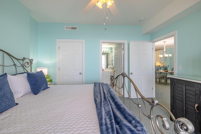 17545 Front Beach Rd Unit 1507, Panama City Beach, FL 32413 - bedroom featuring carpet flooring, a chandelier, ensuite bathroom, and ceiling fan