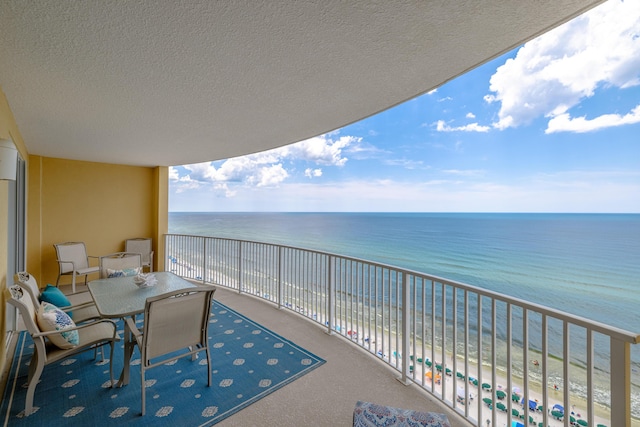 17545 Front Beach Rd Unit 1507, Panama City Beach, FL 32413 - balcony with view of water and beach and outdoor dining space