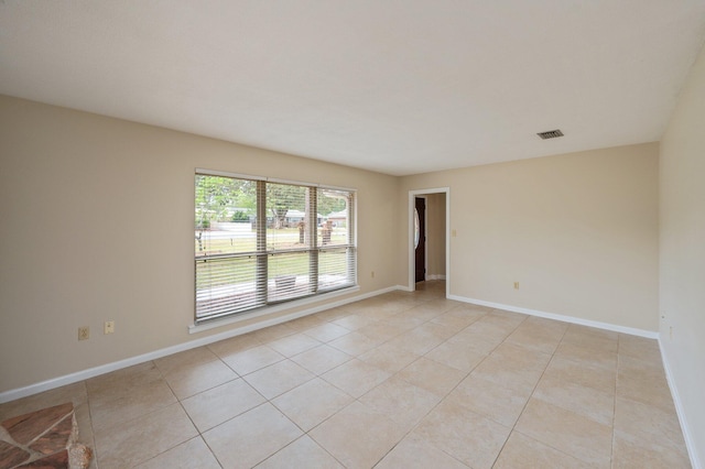 11 Birch Ave, Shalimar, FL 32579 - unfurnished room with light tile patterned floors, visible vents, and baseboards