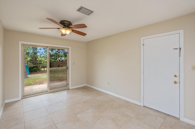 11 Birch Ave, Shalimar, FL 32579 - unfurnished room with baseboards, visible vents, light tile patterned floors, and ceiling fan