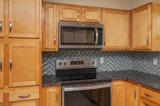 11 Birch Ave, Shalimar, FL 32579 - kitchen featuring appliances with stainless steel finishes and tasteful backsplash