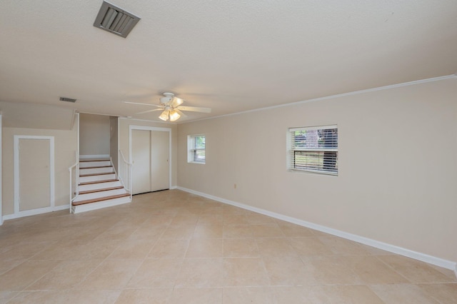 11 Birch Ave, Shalimar, FL 32579 - empty room featuring visible vents, ceiling fan, stairway, and baseboards