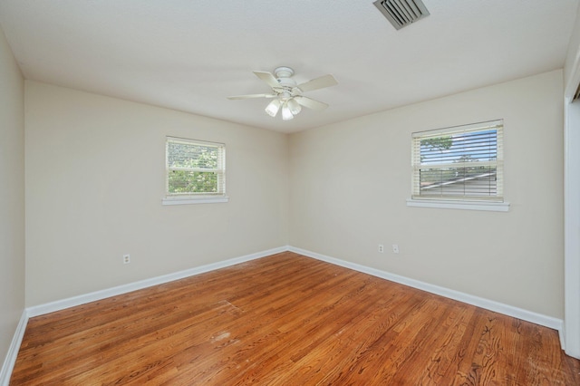 11 Birch Ave, Shalimar, FL 32579 - spare room with visible vents, plenty of natural light, and baseboards