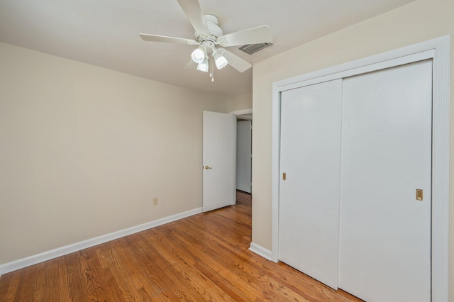 11 Birch Ave, Shalimar, FL 32579 - unfurnished bedroom featuring visible vents, a closet, light wood-style flooring, and baseboards