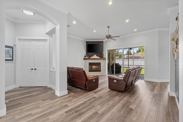 129 Red Maple Way, Niceville, FL 32578 - living area featuring a ceiling fan, light wood-style floors, baseboards, a fireplace, and recessed lighting