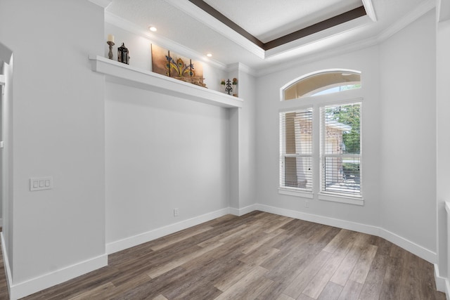 129 Red Maple Way, Niceville, FL 32578 - unfurnished room featuring crown molding, wood finished floors, a raised ceiling, baseboards, and recessed lighting