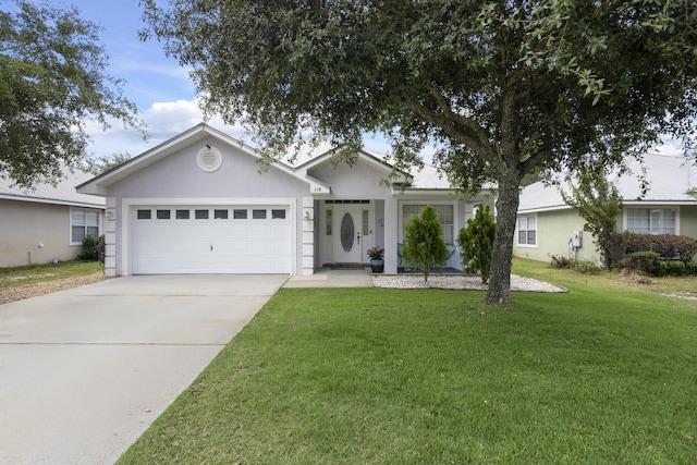 119 Red Bay Ct, Santa Rosa Beach, FL 32459 - ranch-style home with a garage, a front yard, driveway, and stucco siding