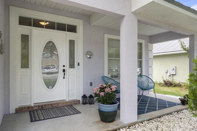 119 Red Bay Ct, Santa Rosa Beach, FL 32459 - doorway to property with stucco siding